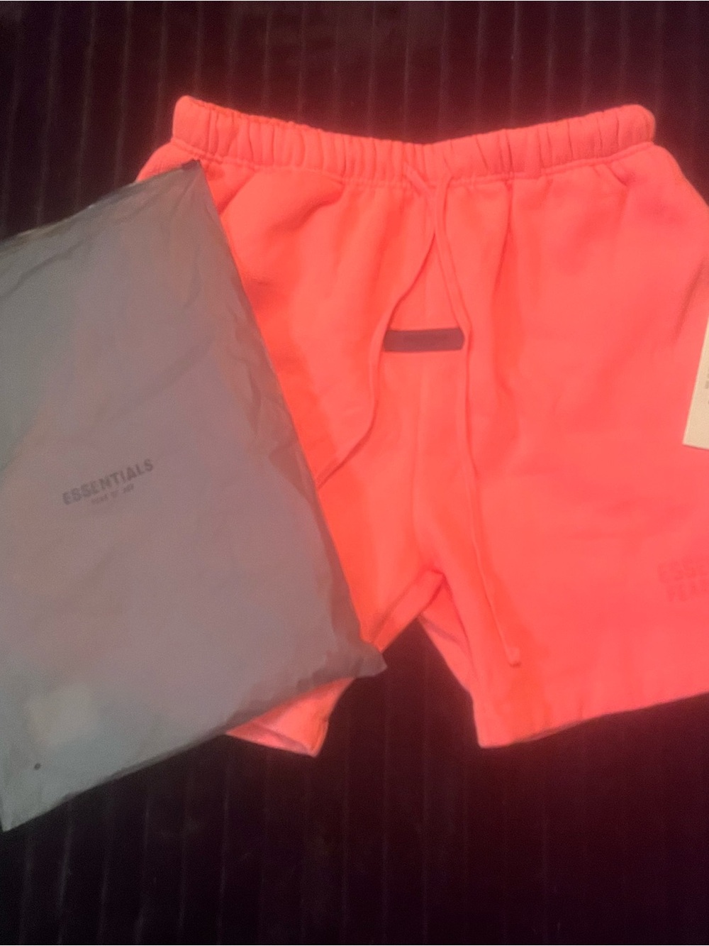Essentials Neon Coral Tee with Subtle Embossed Logo